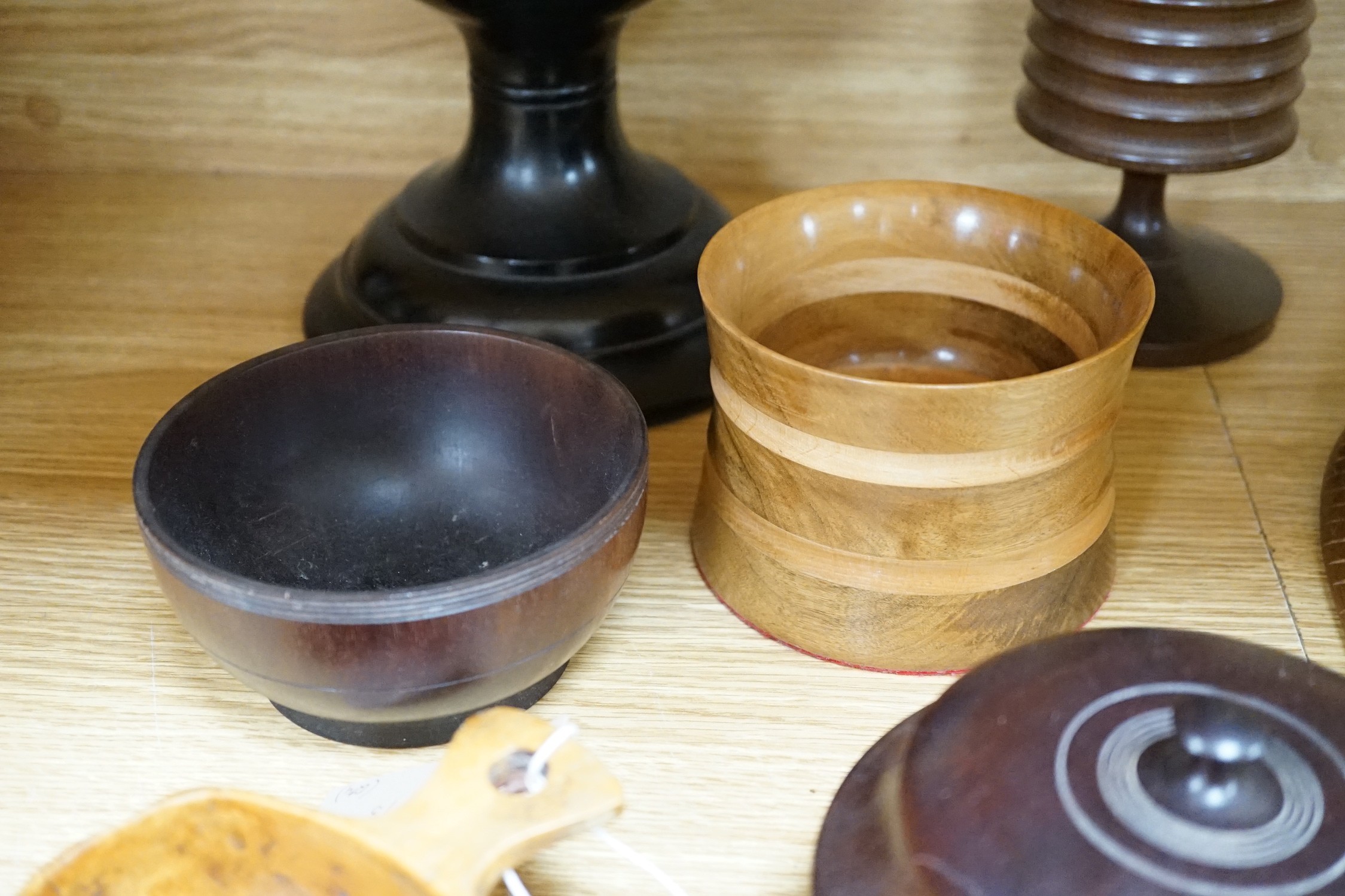 A quantity of African and other carvings including an ostrich egg
